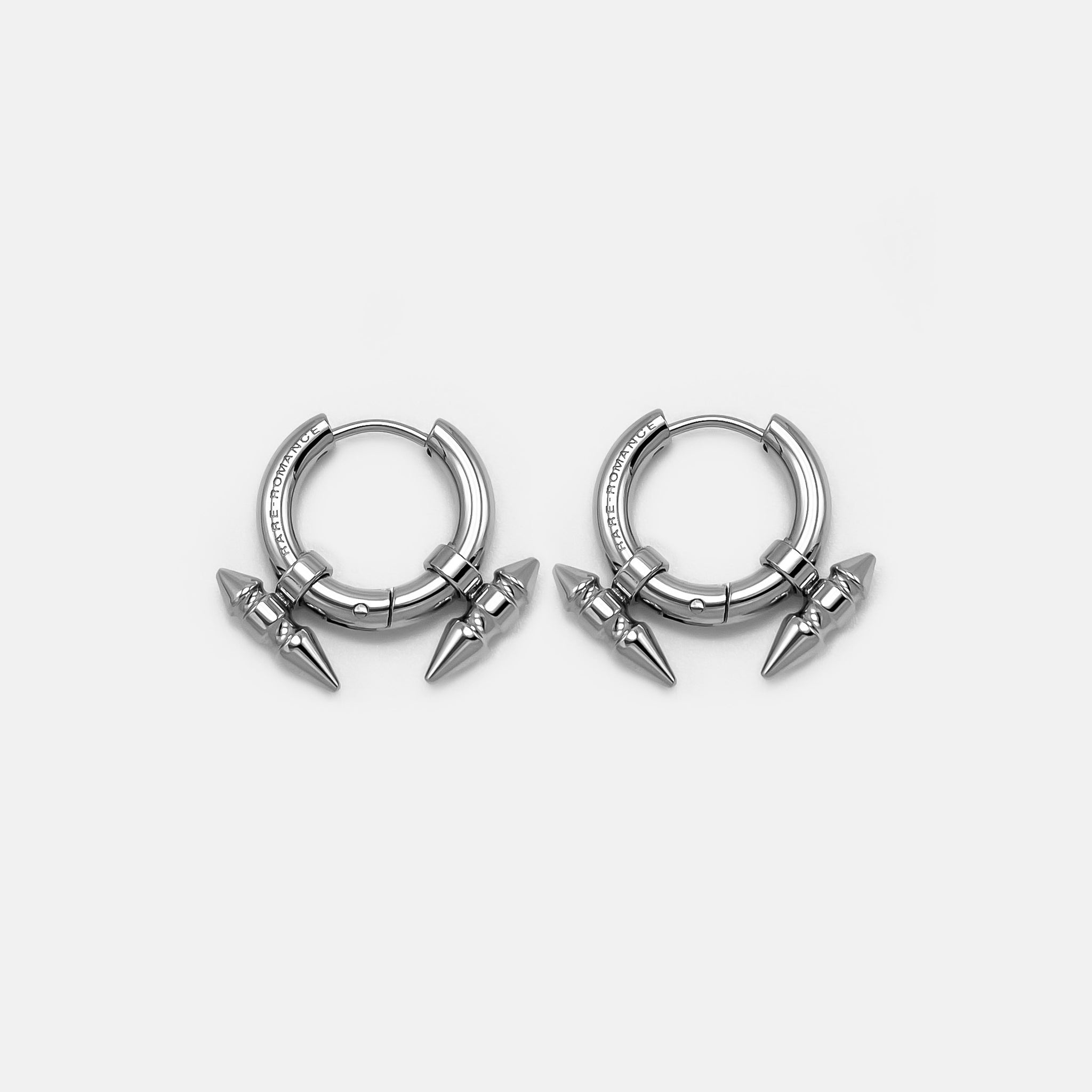 Spike hoop selling earrings. Polished sterling silver